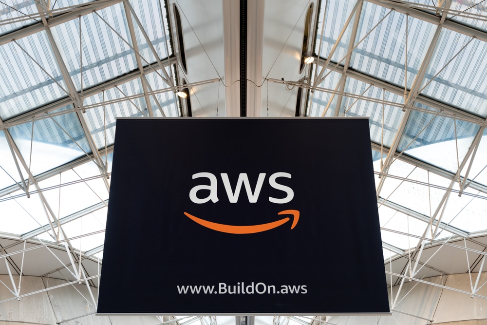 AWS amazon cloud services brand logo at Charles de Gaule Paris airport boarding area, big advertisement