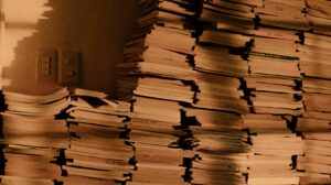 pexels-ian-panelo-5009177 | LG Networks, Inc. mountain of papers